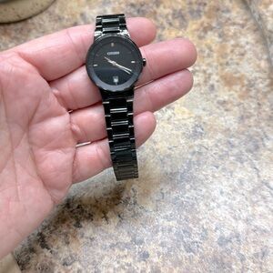 Women’s 8” around black Citizen slide watch